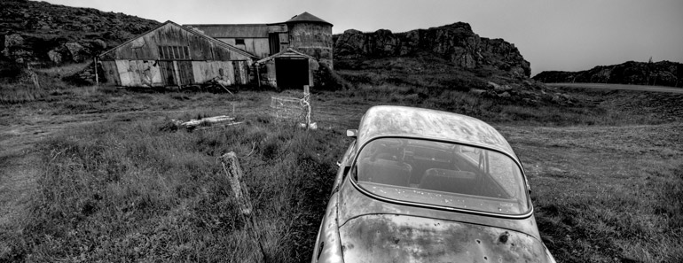 Abandoned Car and Building