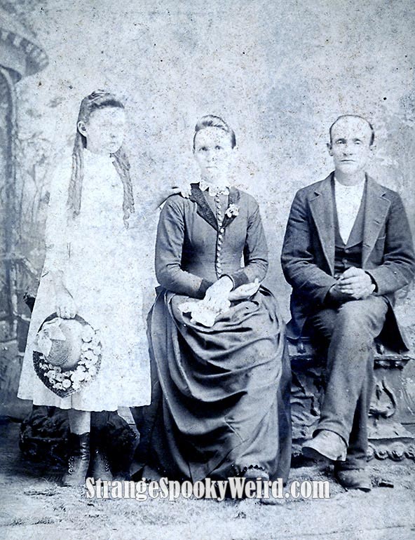 Eerie Family Cabinet Photo 1900s